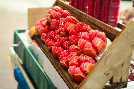 Pomegranate fruit. Pomegranates Juice sold in the chinatown market . 