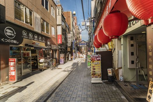 Red paper lanterns of restaurant in the shopping street from the west exit of Kanda Station on the Yamanote Line. The street extends over 300 meters and has no less than 100 shops.