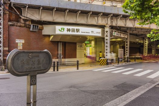 Underpass with metal pillar located on Tacho-o-dori Street at the west entrance of Kanda Station on the Yamanote Line. The street extends over 300 meters and has no less than 100 shops.