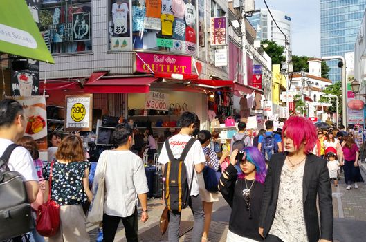 TOKYO, JAPAN -May 29, 2018. People with extreme clothing fashion at Takeshita street, Harajuku.
