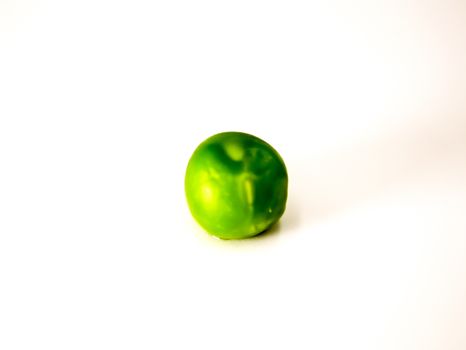 Green peas on a white background
