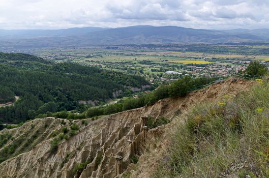 A view from path on the slope of the Stob Pyramids to the valley of the village of Stob, Rila mountain, Kyustendil region, Bulgaria, Europe