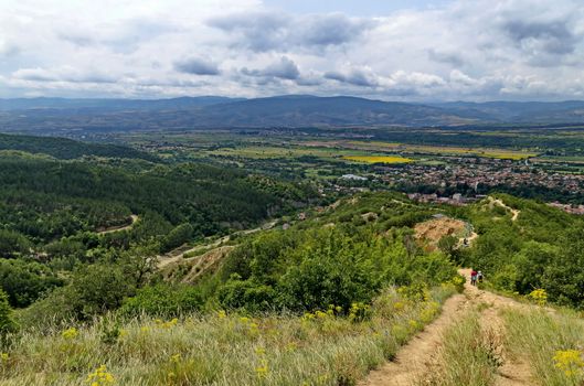 A view from path on the slope of the Stob Pyramids to the valley of the village of Stob, Rila mountain, Kyustendil region, Bulgaria, Europe