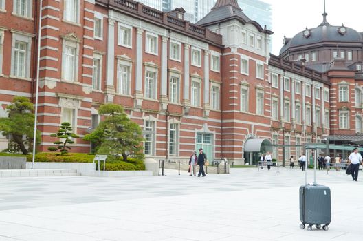 TOKYO, JAPAN - MAY 30, 2018 : People passing the Marunouchi Station Building at Tokyo Station, Tokyo Station is the main intercity rail terminal in Tokyo and busiest station in Japan.