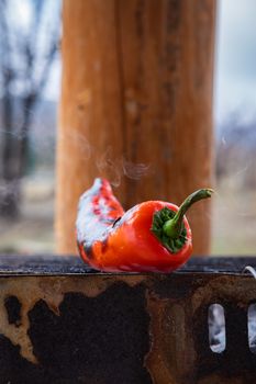 Red chili pepper grilling on BBQ