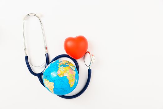World health day concept, Stethoscope, globe and red heart on white background with copy space. Global health care