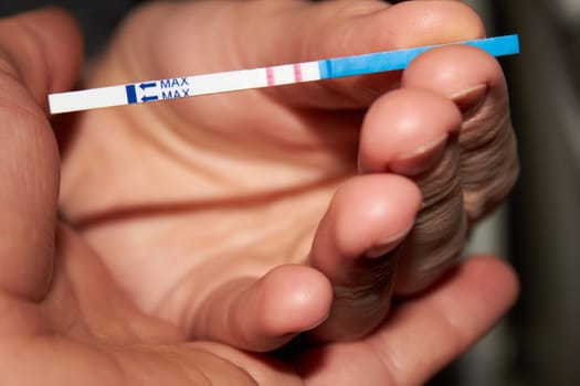 Woman holding pregnancy test, New life and new family concept. Shallow dof