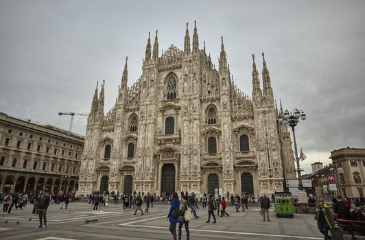 MILAN, ITALY 10 MARCH 2020: Milan Cathedral with tourists and people strolling en masse on the square