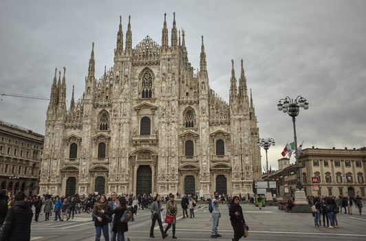 MILAN, ITALY 10 MARCH 2020: Milan Cathedral with tourists and people strolling en masse on the square