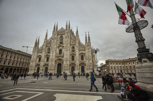 MILAN, ITALY 10 MARCH 2020: Milan Cathedral with tourists and people strolling en masse on the square