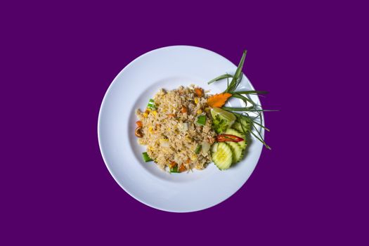 Salt and pepper. Onion rings. Asian Thai food on white plates with purple background with copy space