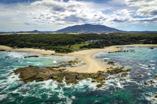 Scenic coastline Mystery Bay wth Mount Gulaga in the background