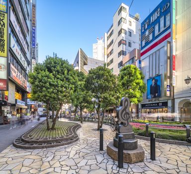 Marble monument shaped in treble clef on Sunshine Street at the east exit of Ikebukuro in Tokyo.
The sidewalk curves emphasized by the blocks embedded with step differing grasses decorate moss stone flowers.
The lyrics of Mr. Sada Masashi's love song "To Toshima Future" of Toshima citizens are engraved on the monument.