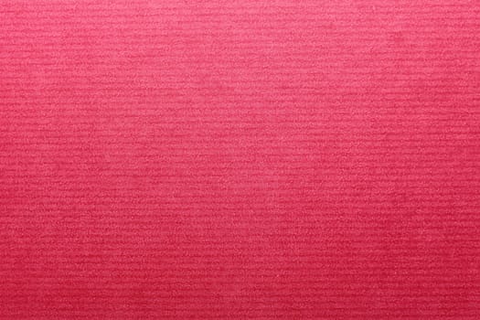 The picture shows a background with a pink surface