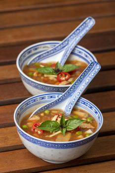 chinese sweet and sour soup on wood