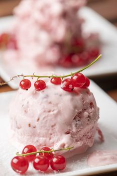 closeup of currant ice cream on a plate