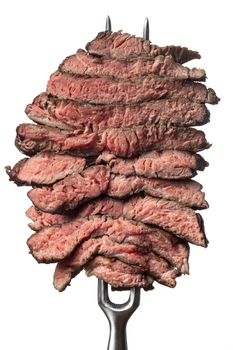 slices of a steak on white background