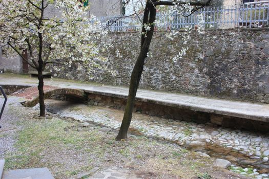 ruined paths built in stone and rock in the Tuscan landscape in Borgo a Mozzano in an ancient medieval village in Italy