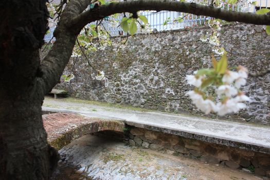 ruined paths built in stone and rock in the Tuscan landscape in Borgo a Mozzano in an ancient medieval village in Italy