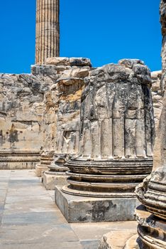 A base of a column of the eastern facade of the Temple of Apollo at Didyma, Turkey, on a sunny summer day