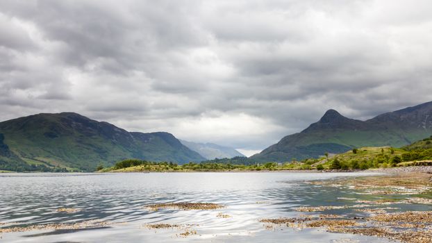 The view across Loch Leven to the Pap of Glencoe in the Scottish highlands.  Loch Leven is a sea loch on the west coast of Scotland.