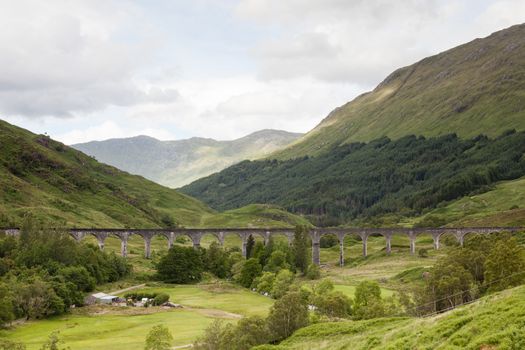 A view of Glenfinnan Viaduct on the West Highland Line in Scotland between Fort William and Mallaig.  The railway viaduct has featured in numerous films and television programmes.