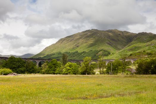 A view of Glenfinnan Viaduct on the West Highland Line in Scotland between Fort William and Mallaig.  The railway viaduct has featured in numerous films and television programmes.