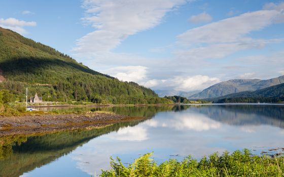 The view across Loch Leven from Ballachulish towards Ballachulish Bridge in the Scottish highlands.  Loch Leven is a sea loch on the west coast of Scotland.