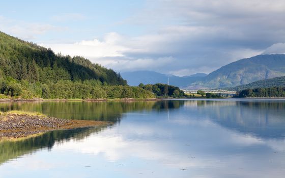The view across Loch Leven from Ballachulish towards Ballachulish Bridge in the Scottish highlands.  Loch Leven is a sea loch on the west coast of Scotland.