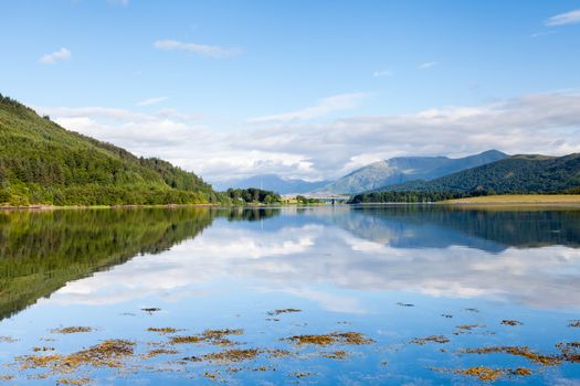 The view across Loch Leven from Ballachulish towards Ballachulish Bridge in the Scottish highlands.  Loch Leven is a sea loch on the west coast of Scotland.