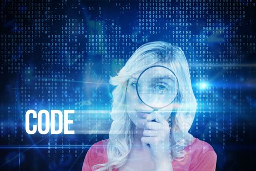 The word code and fair-haired woman looking through a magnifying glass against blue technology interface with binary code