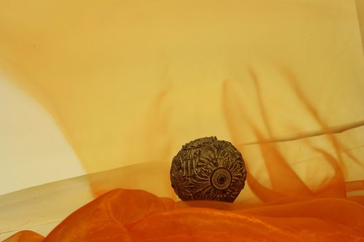 Orange back ground for various designs with a ball in the middle