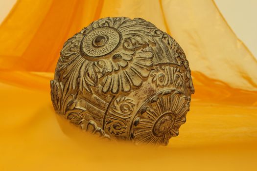 Orange background for various designs with copy space with a ball on foreground
