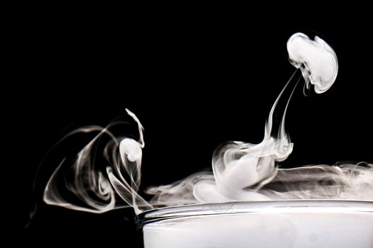 simple white smoke on black background with copy space
