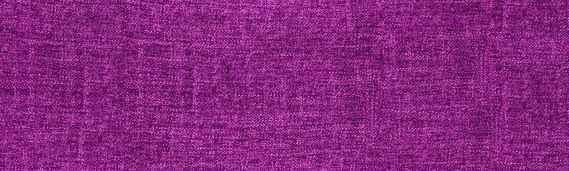 fabric background with purple and white color shot from above giving lots of copy space