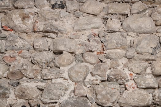 Old stone wall of old European building. Great for background use with copy space