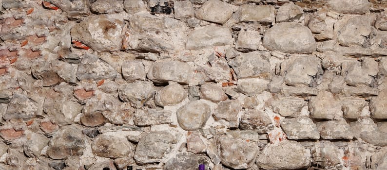Old stone wall of old European building. Great for background use with copy space