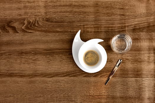 flat design coffee for with water on a wood background