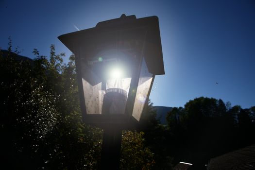 the light. - getting a bright idea. Lantern with a burning light bulb