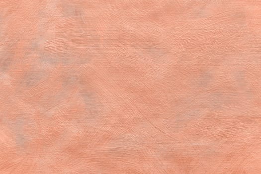 Abstract grungy decorative texture. Textured paper with copy space. The mottled surface of the paper is orange, texture closeup.