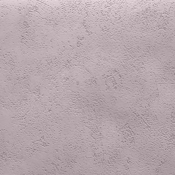 Abstract grungy decorative texture. Textured paper with copy space. The mottled surface of the paper is pink, texture closeup.