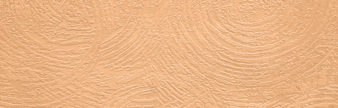 Abstract grungy decorative texture. Textured paper with copy space. The mottled surface of the paper is orange, texture closeup.