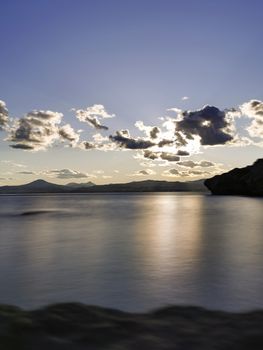 Cape Melagkavi shoreline at gulf of Corinth, Greece. Sunset.