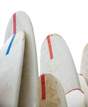 Isolation Of Grungy Old Sandy Surfboards For Rental In Waikiki, Hawaii