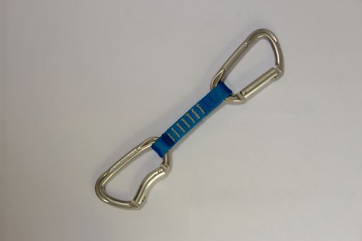 Single rock climbing quickdraw, with aluminum carabiners and blue slings