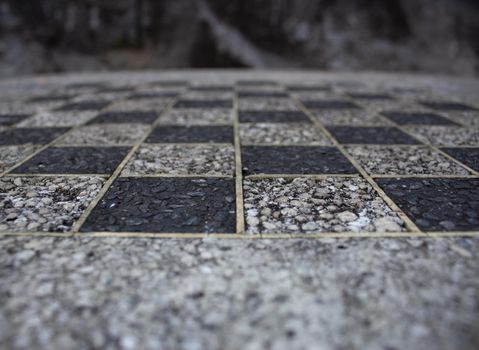The detail of a chess table of a outdoor park