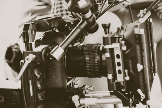 Film industry. Filming with professional camera background