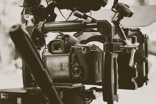 Film industry. Filming with professional camera background