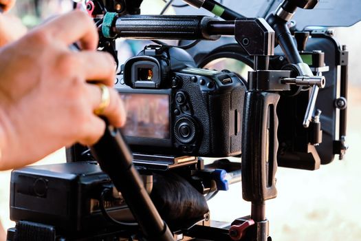 Film industry. Filming with professional camera background
