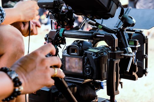 Film industry. Filming with professional camera background